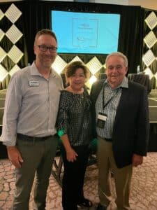 Matt Gruhn, Ann Baldree and Buck Pegg of Chaparral Robalo Boats caught up at the company's recent dealer meeting.