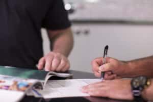 customer signing paperwork