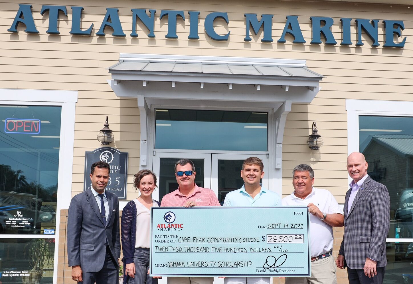 Atlantic Marine donates to CFCC Outboard System students; money for scholarships