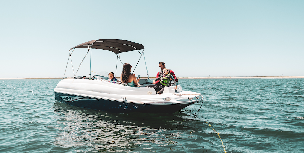 Family in a boat on water