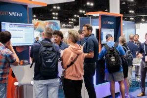 Lightspeed booth at Dealer Week showcasing CRM and email marketing for marine dealers