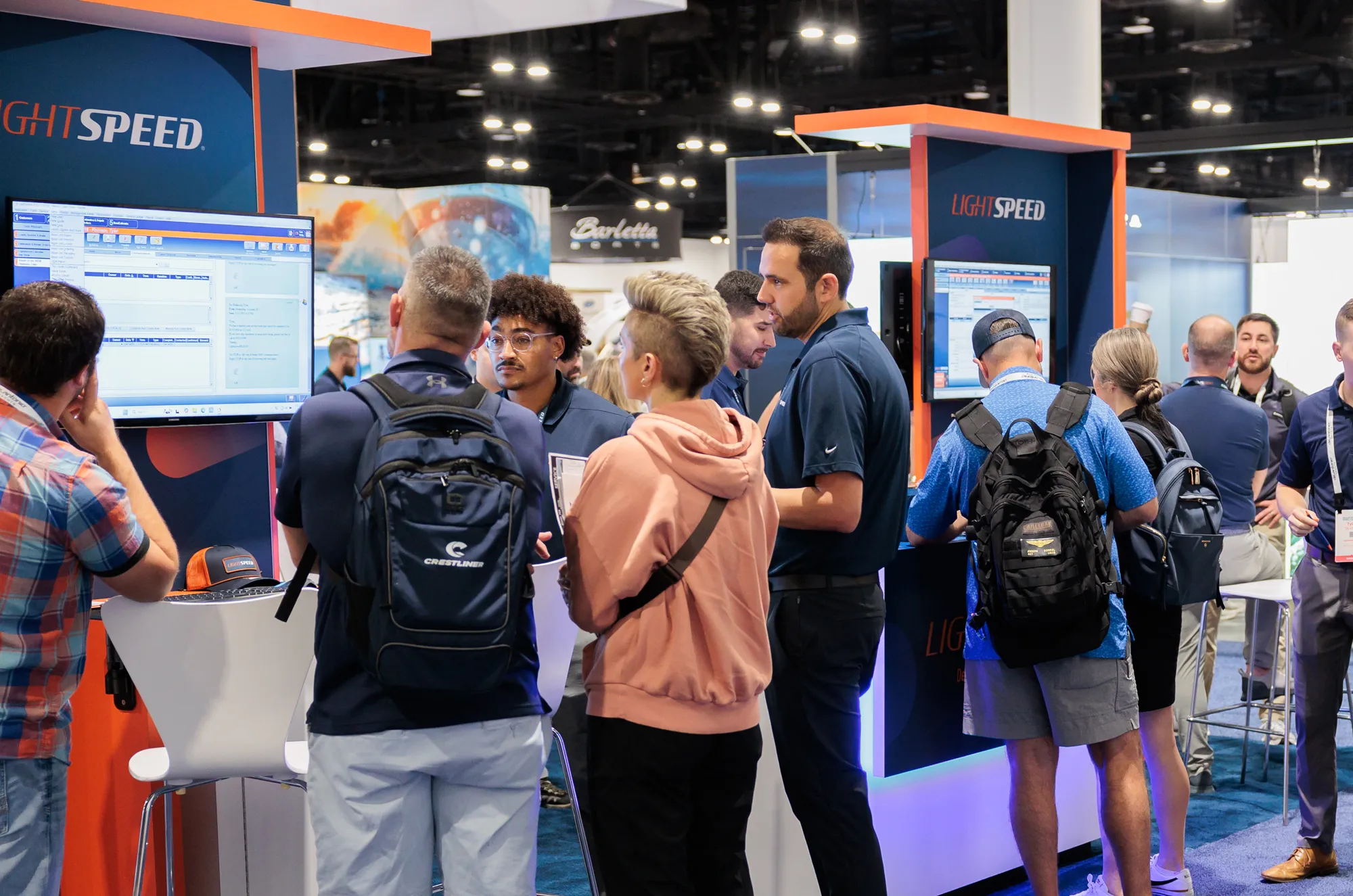 Lightspeed booth at Dealer Week showcasing CRM and email marketing for marine dealers