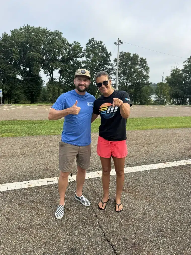 Community members supporting boating access education and responsible boating initiatives near a local lake
