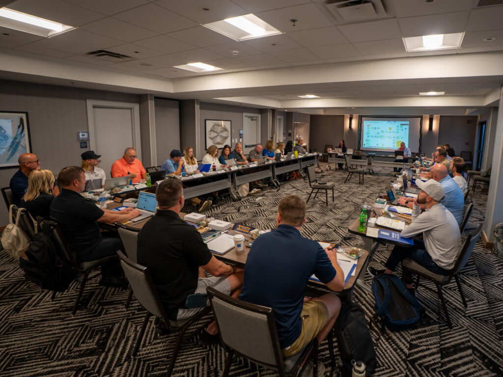 conference attendees in conference room