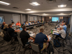 conference attendees in conference room