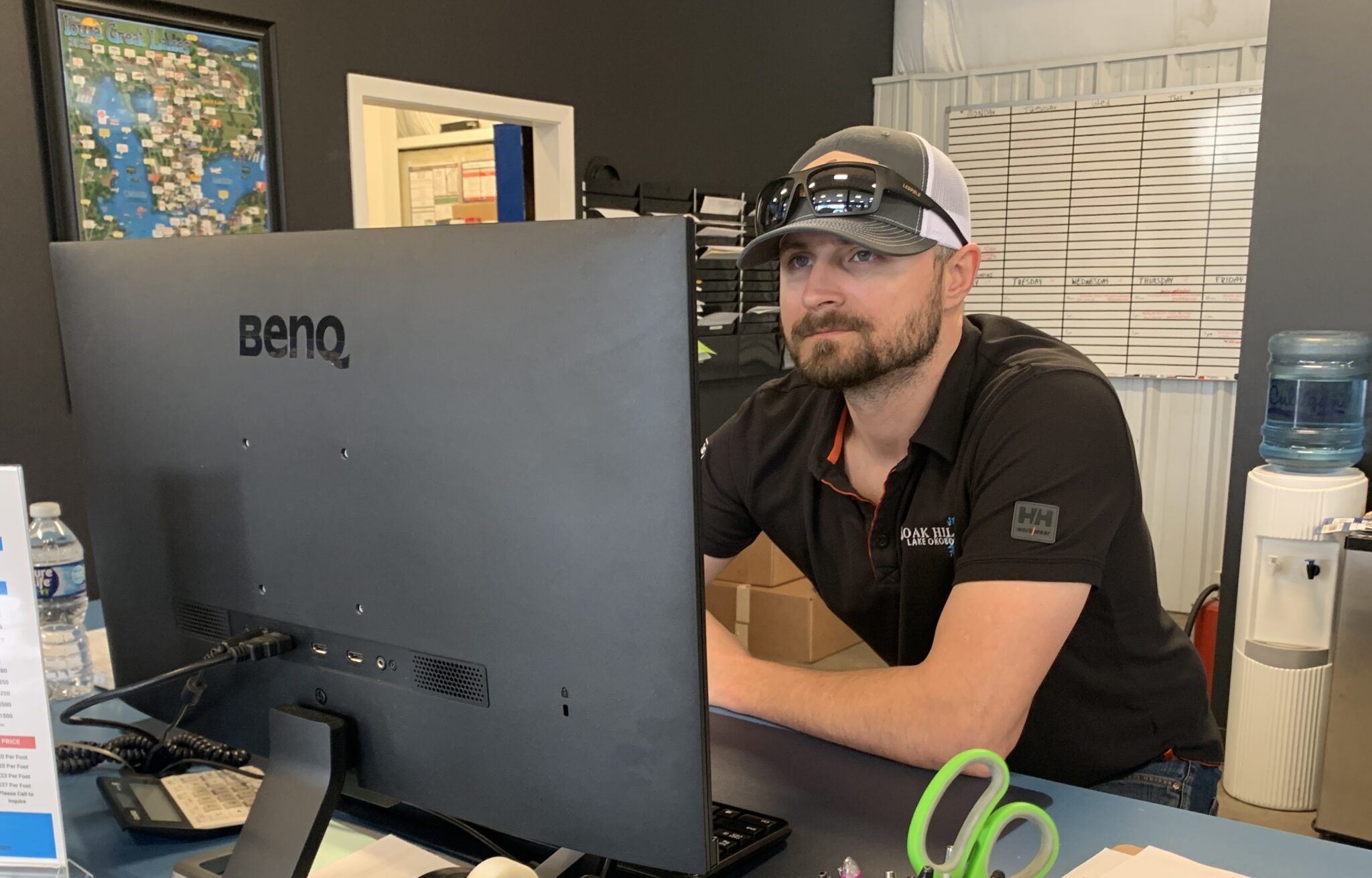 employee at Service Department desk